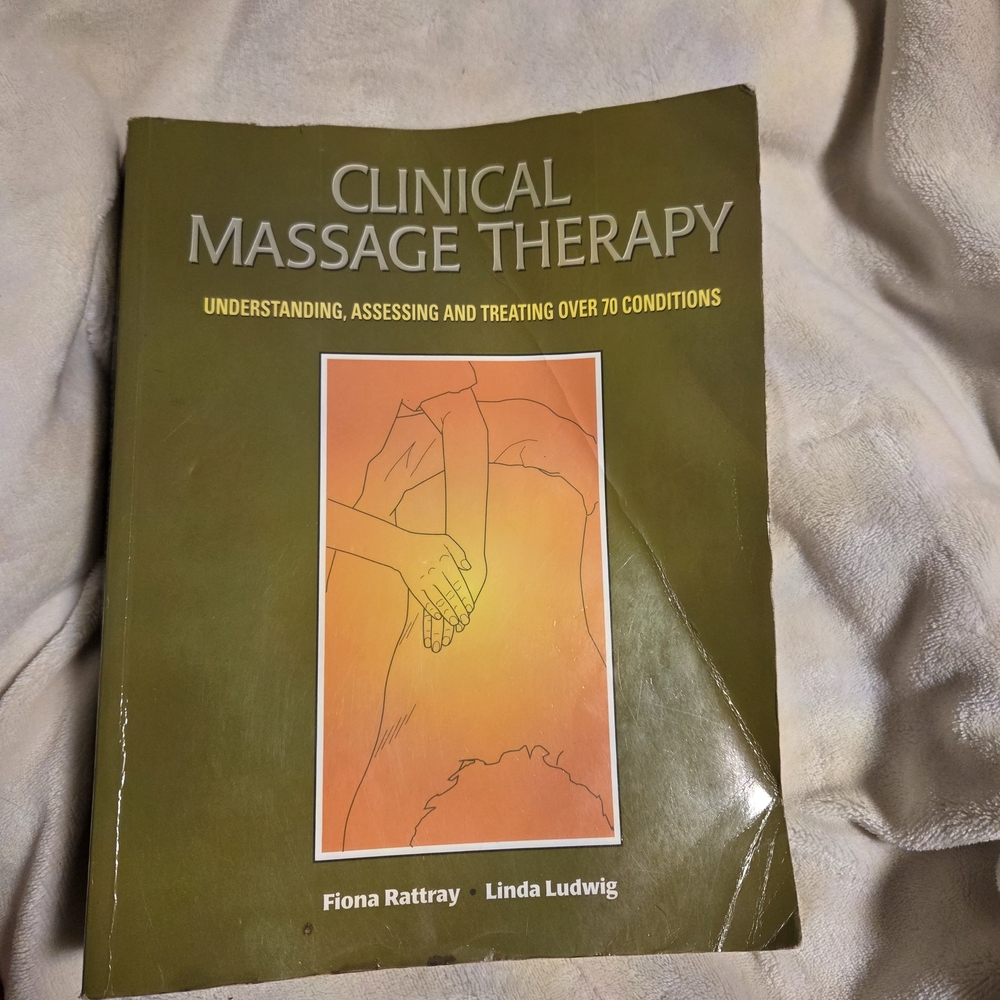Clinical Massage Therapy Book with Orange Illustration